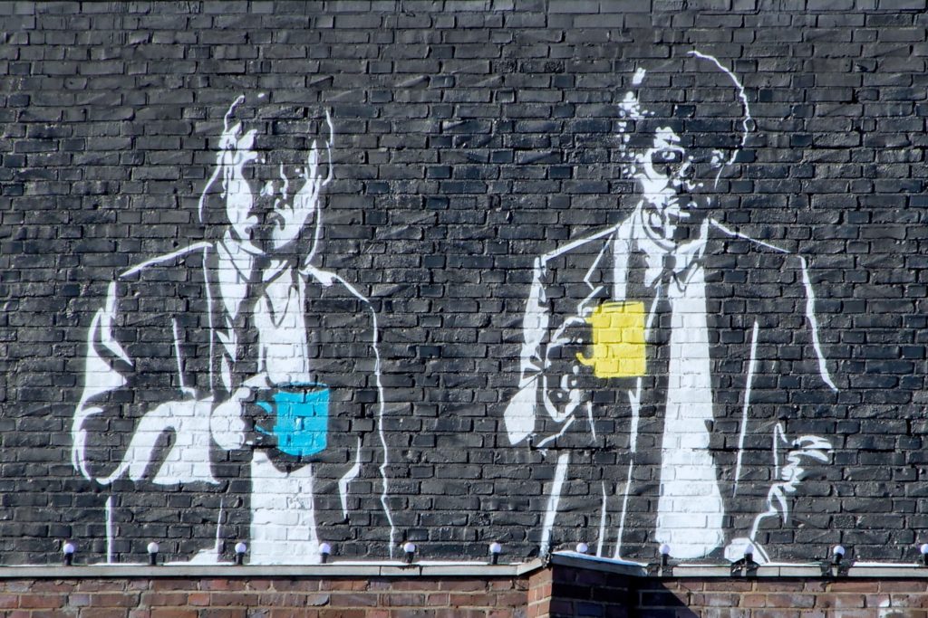 Street Art in Hannover. Das Mural am Capitol-Gebäude in Linden erinnert an den legendären Banksy.